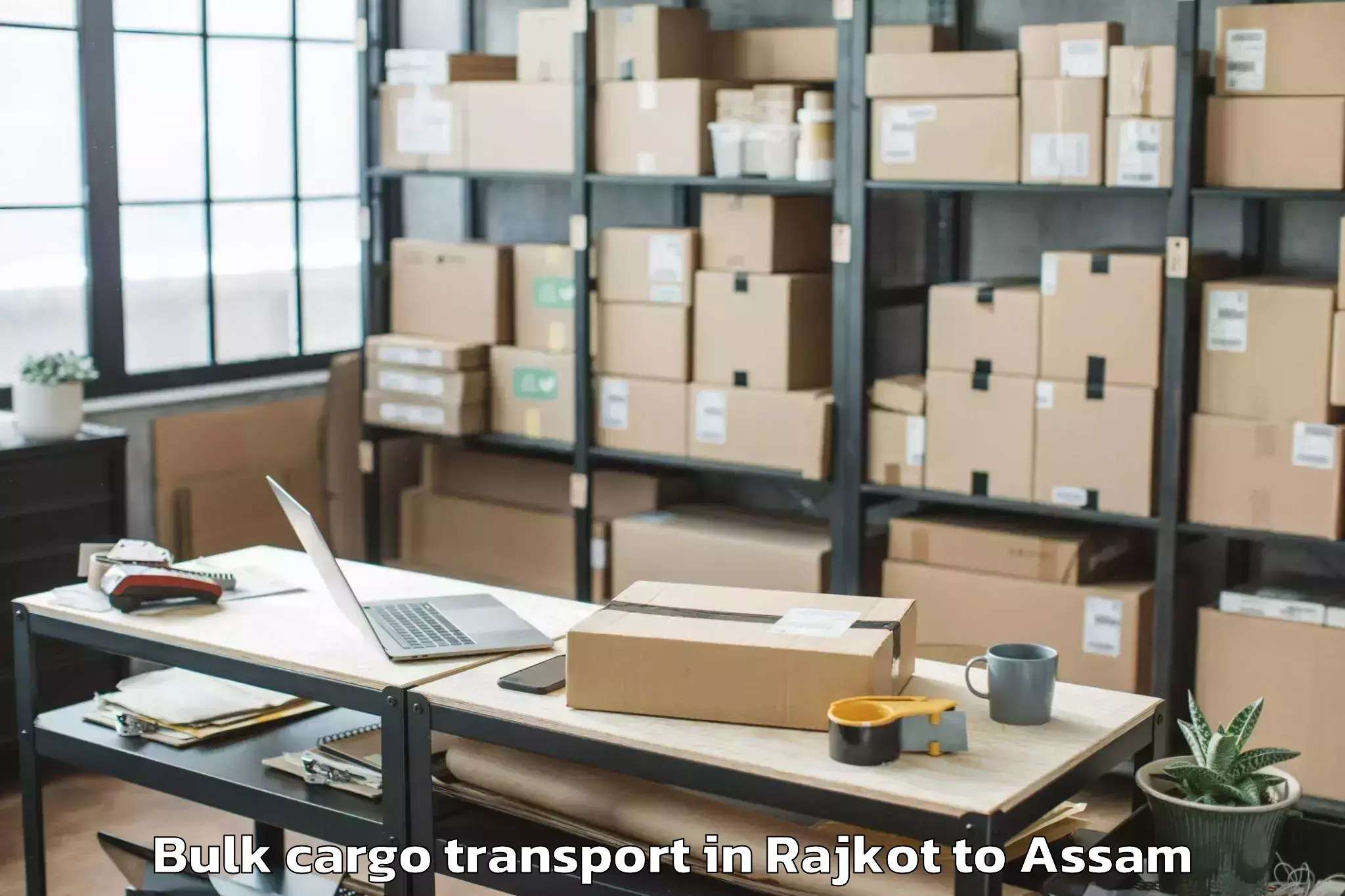 Hassle-Free Rajkot to Kharupetia Bulk Cargo Transport